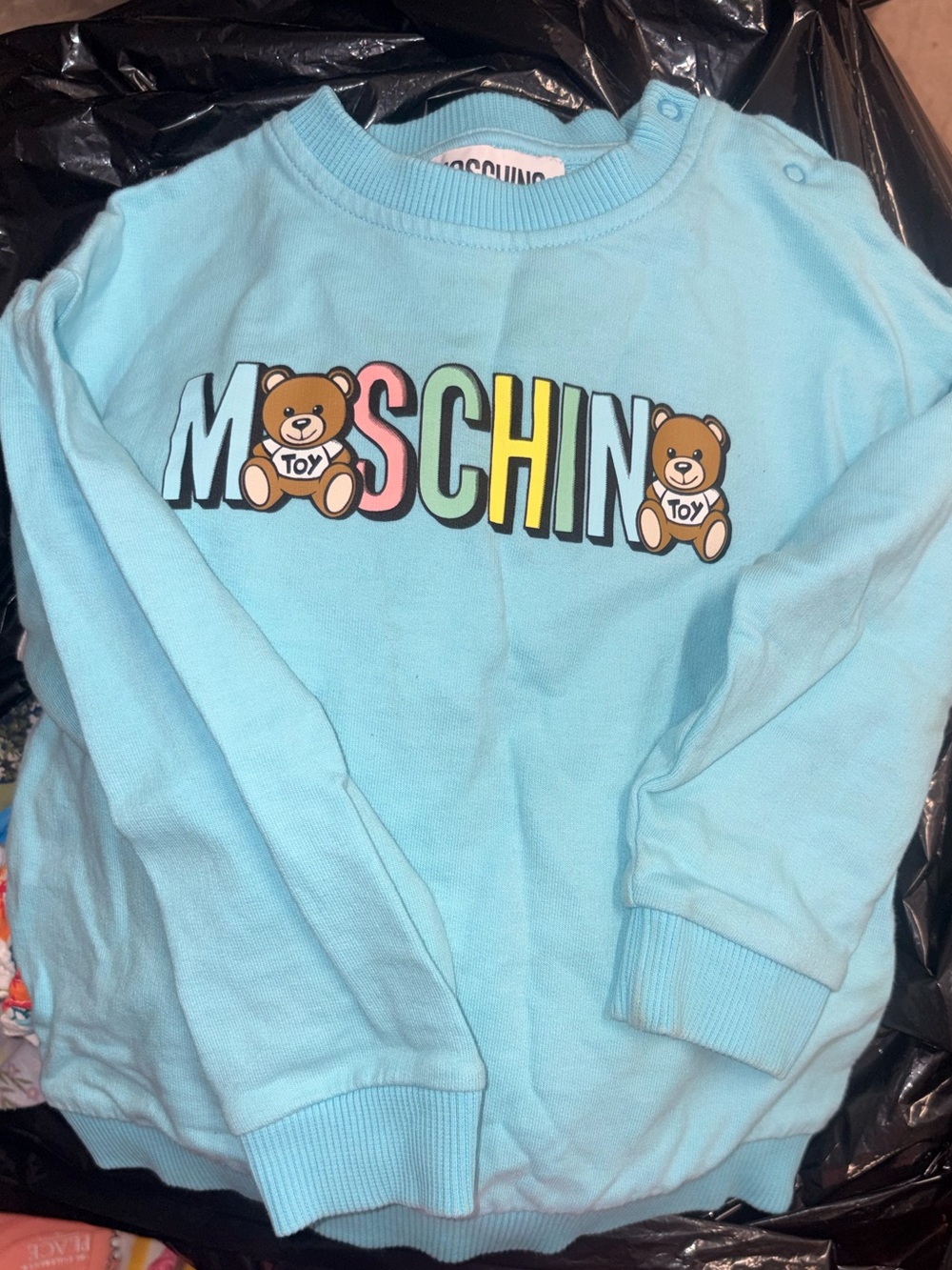 Moschino Kids Light Blue Teddy Logo Sweatshirt with Multicolor Lettering